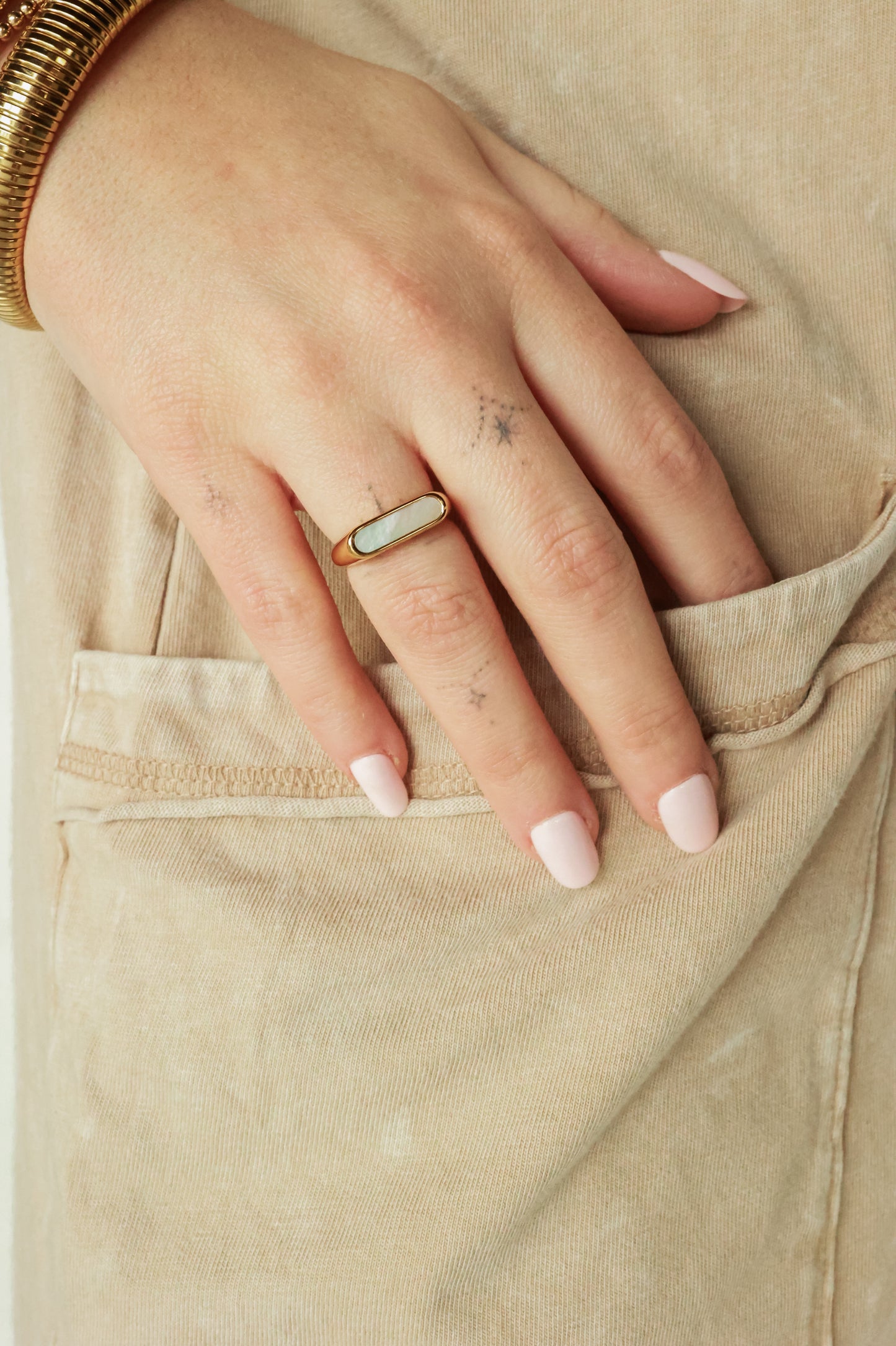 THE PEARL CREST RING