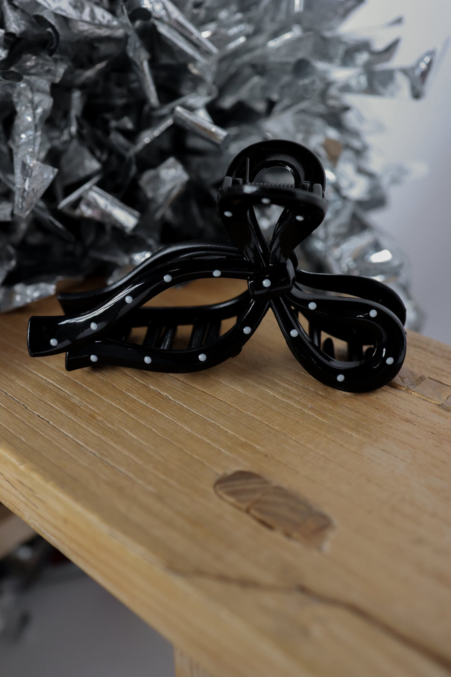 BLACK POLKA DOT BOW CLIP