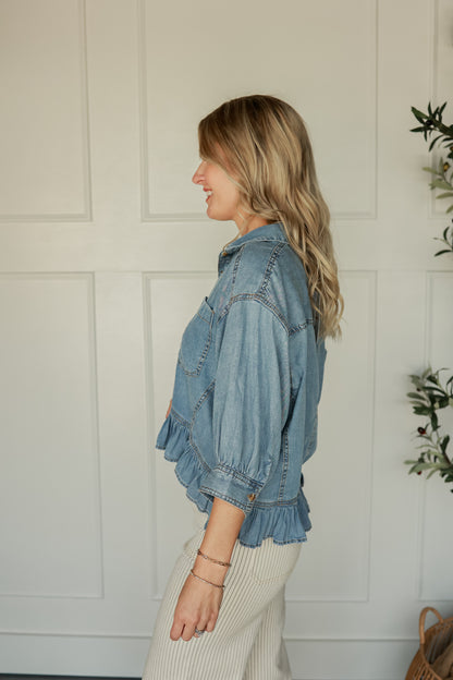 THE RUFFLE HEM DENIM TOP
