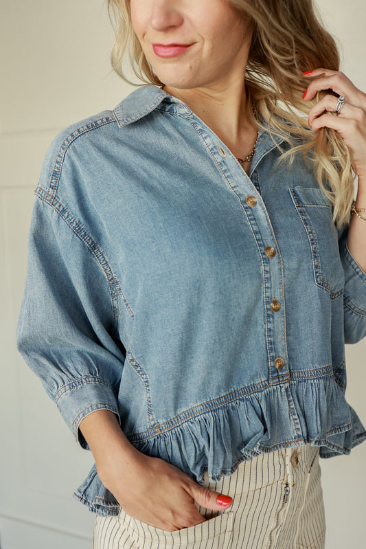 THE RUFFLE HEM DENIM TOP