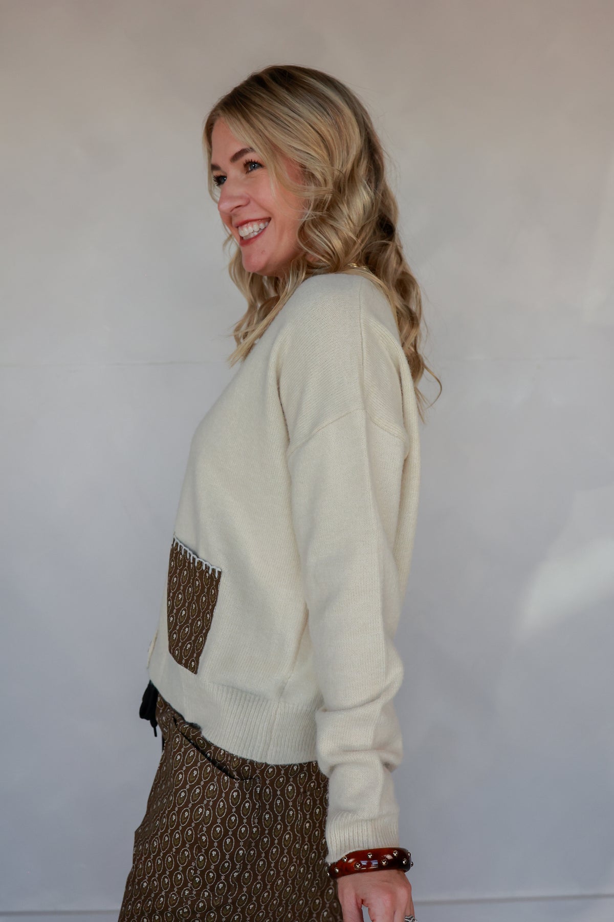 THE VINTAGE MEDALLION SWEATER