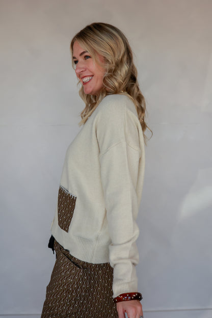 THE VINTAGE MEDALLION SWEATER