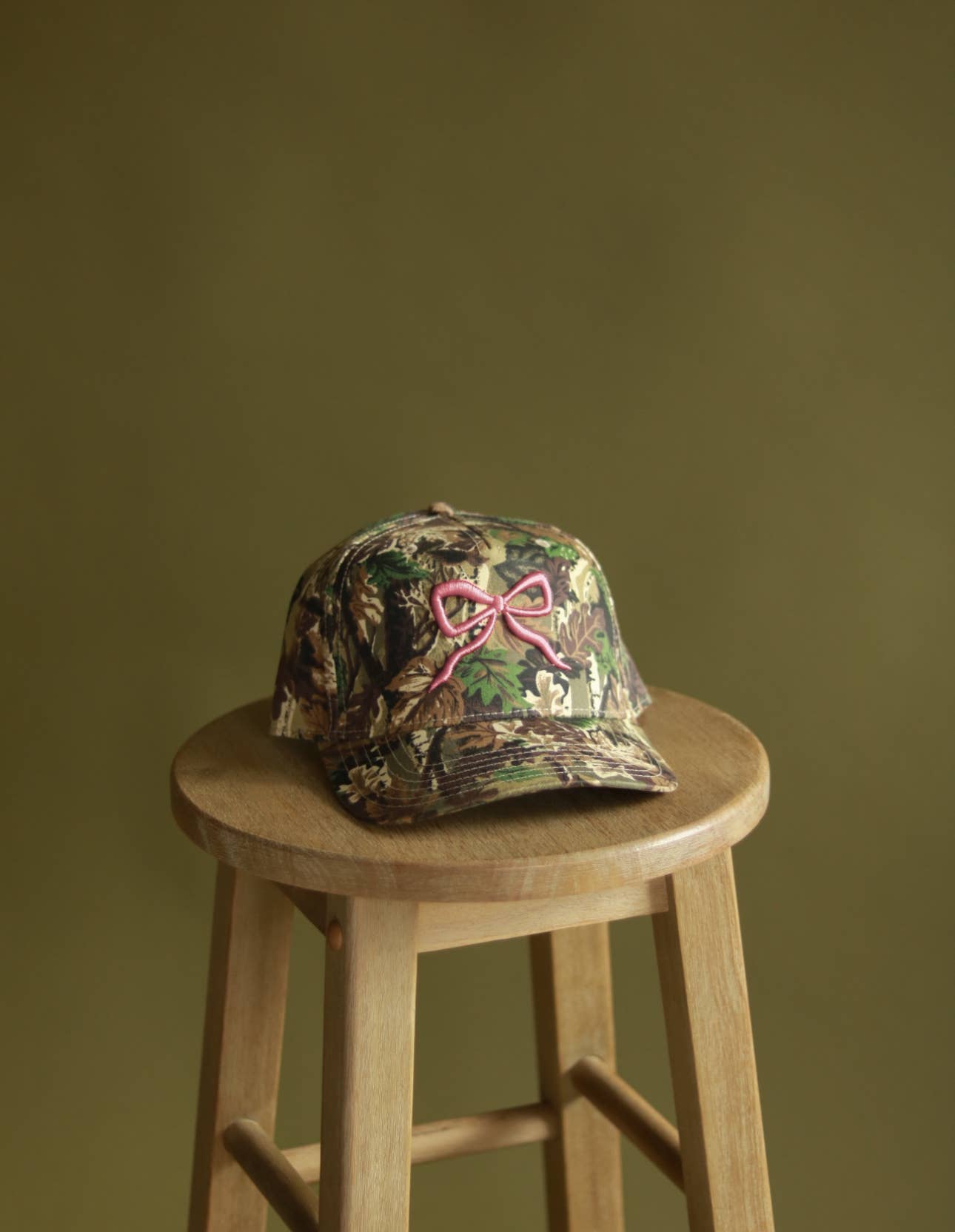 PINK BOW | CAMO TRUCKER HAT