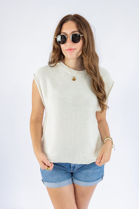 A STATEMENT KNIT TOP IN WHITE