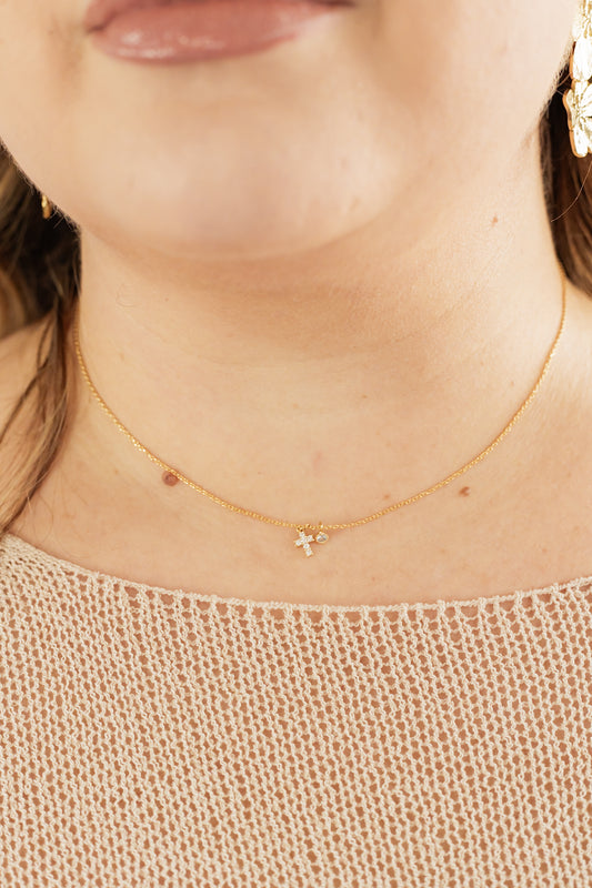 THE SMALL AND DAINTY CROSS NECKLACE