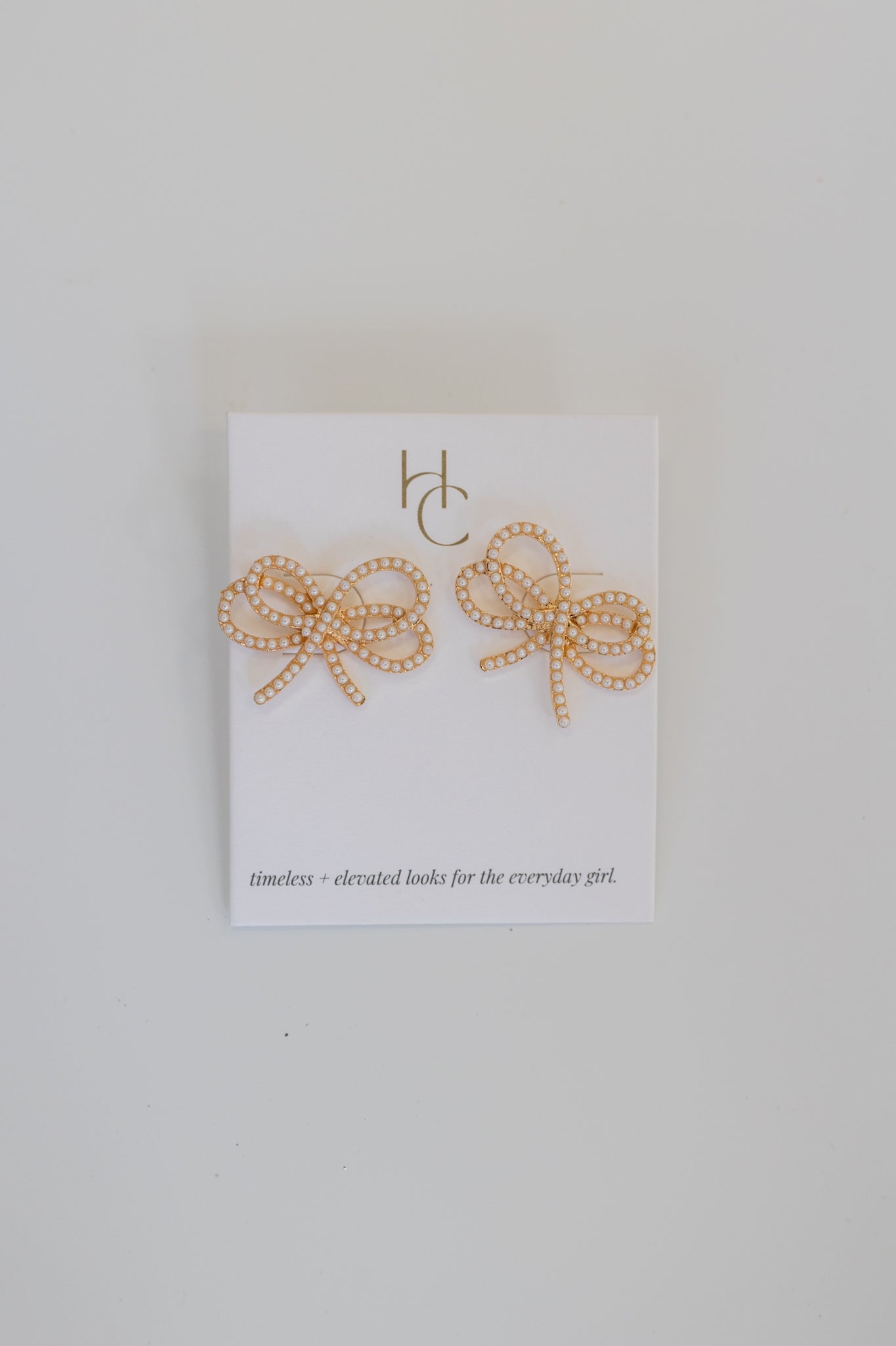 THE ELEGANT BOW STUDS