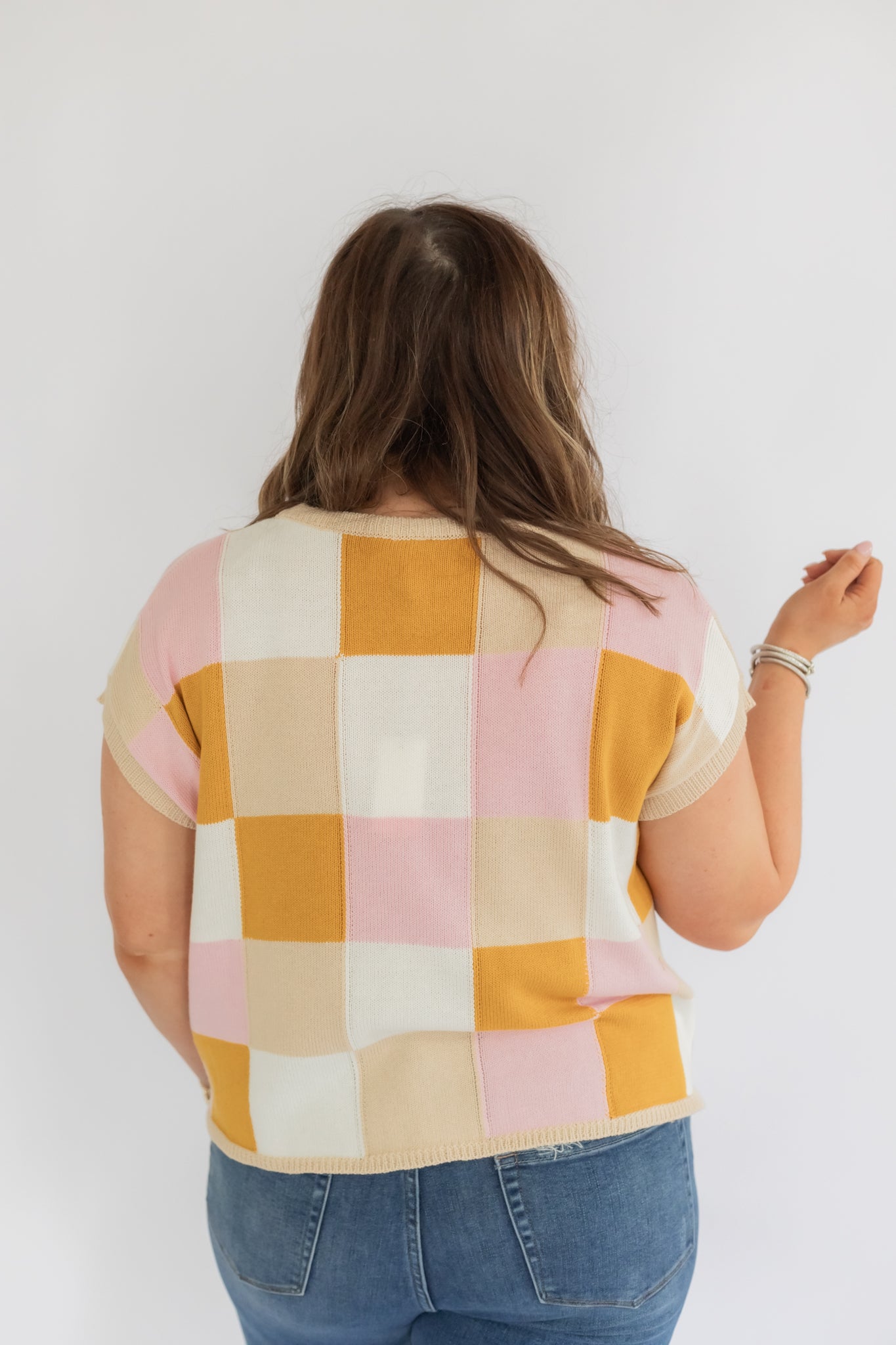 A CHECKERED MOMENT TOP